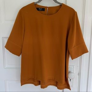 Brass Clothing Shirt, pumpkin/mustard, size medium. NEW